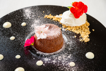 chocolate fondant with berries and flowers
