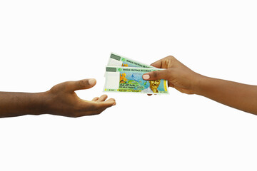 Hand giving 3D rendered Djiboutian franc notes to another hand. Hand receiving money