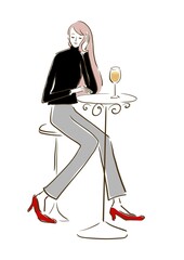 Woman enjoying a drink in a café.