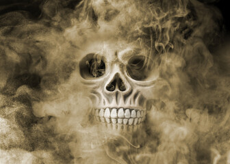 Scary skull emerging from smoke in darkness