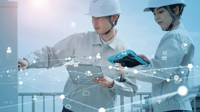 タブレットで設備点検する作業員とネットワークイメージ