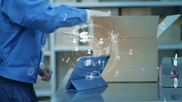 Worker using a tablet in a warehouse and communication network concept. IIoT. Industrial Internet of Things.