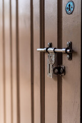 Closeup of metal lock on door in india