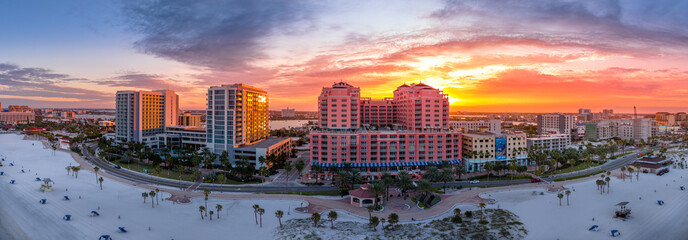 Early morning sunrise above Clearwater beach near Tampa Florida with colorful orange, red sky