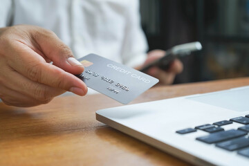 Mobile payments with wallet app technology Man paying and shopping with smartphone application Digital money transfer, banking and e-commerce.