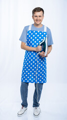 a man in a blue apron, blue t-shirt, jeans and white sneakers with an iron. isolated white...