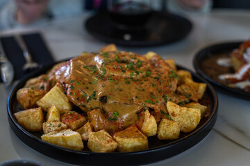 roasted lamb chops with potatoes and anana 