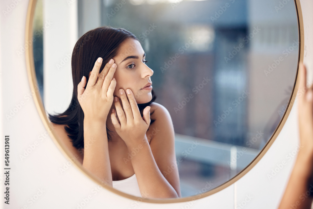 Poster Skincare, facial and woman by a mirror to check for acne breakout or pimples while cleaning face in bathroom. Beauty, wellness and healthy girl grooming or checking cosmetics results or prp progress