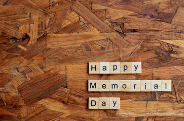 Happy Memorial Day text on wooden square, holiday concept quotes