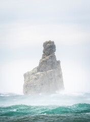 waves crashing on rocks