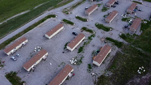 Affordable housing in rural area close up circling pulling away
Morley Alberta Canada