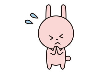 ごめんねのポーズをとるウサギのキャラクター