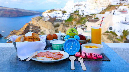 Blue alarm clock Intermittent fasting eight hour feeding window concept and eating a healthy food background