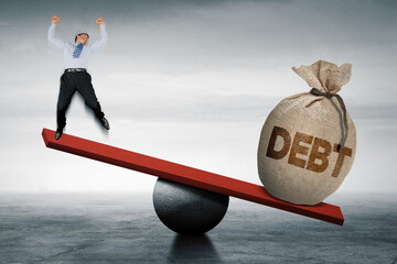 Businessman outweighing weights than debt word