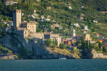 Idyllic Lake Garda in Malcesine old town at sunset, Italian alps