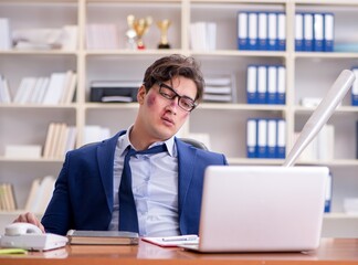 Angry aggressive businessman in the office