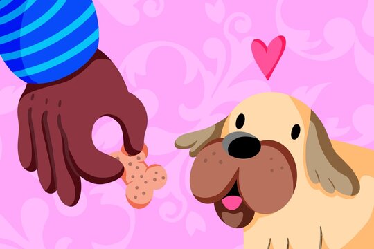 A hand offers a cookie to a dog