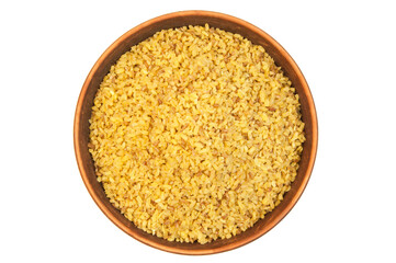 bulgur in a clay bowl on a white background. the concept of a good harvest of bulgur