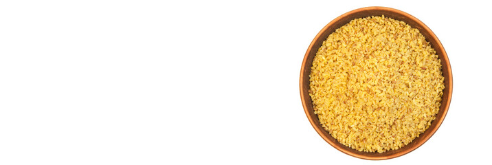 bulgur in a clay bowl on a white background. the concept of a good harvest of bulgur