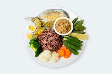 Mackerel chili paste with vegetables, boiled egg, fried mackerel on wood background, top view, Thai Traditional food