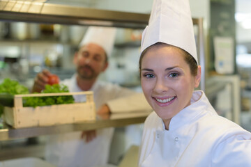 portrait of young cheerful chef