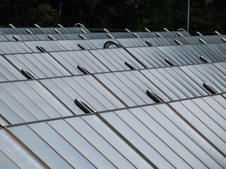 PV solar panels from solar field providing alternative green energy used for heating. Solar thermal...