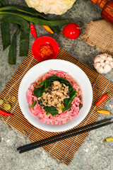 noodles with pink carrot vegetables are suitable for vegetarians