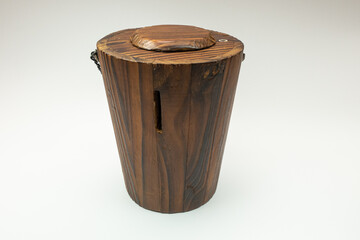 
tea leaves in a container with a white background