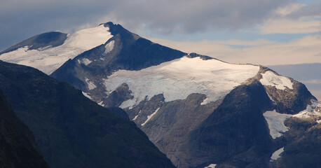 View of the Jostedalsbreen Glacier. Mountains covered with snow and ice. Norwegian landscape. Panorama. Jostedalsbreen National Park, Norway, Scandinavia.