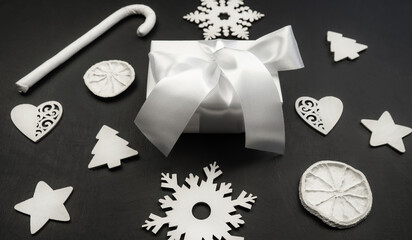 Gift white box on a black background. Holiday concept.Christmas. New Year.