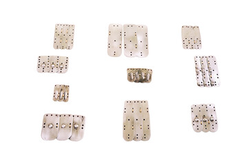 Manufacture of medieval armor and chain mail to protect soldiers in battle, isolated on a white background. Reconstruction of the events of the Middle Ages in Europe.