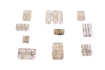 Manufacture of medieval armor and chain mail to protect soldiers in battle, isolated on a white background. Reconstruction of the events of the Middle Ages in Europe.
