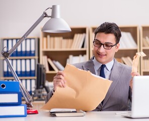 Businessman receiving letter in the office