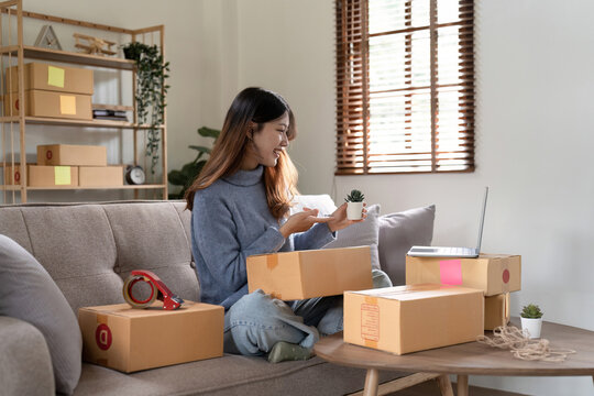 Business Start up SME concept. Young startup entrepreneur small business owner working at home, live boardcast with laptop situation.