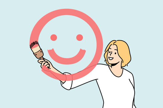 Girl paints smiling face with brush and red paint on glass in front of her. Blonde young woman spreading positive vibes, emotions. Painter have fun. Optimistic lady. Dont worry, be happy vector.
