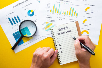 Hand writing about plan listing for 2023 - To Do List Cocept