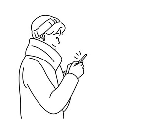 Young man with cellphone waiting for metro 