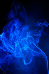 Blue smoke motion on black background.