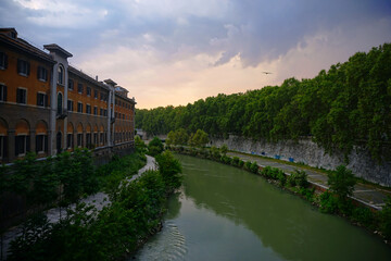 Fototapeta premium View over Tiber River with Fatebenefratelli Hospital on Tiber Island, Rome, Italy