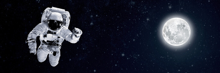 Small child wants to fly into space wearing an astronaut's helmet