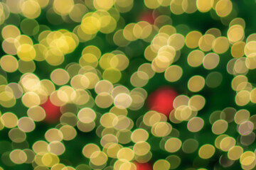 Abstract blurred christmas tree with bokeh light background