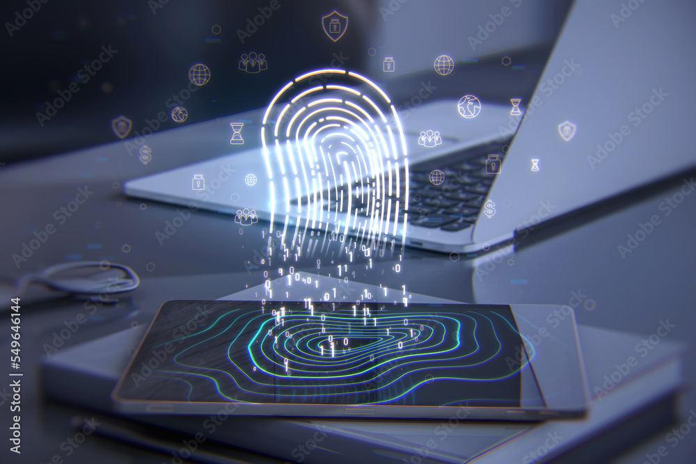 Poster close up of tablet and laptop on desktop with supplies and glowing digital fingerprint hologram. dig