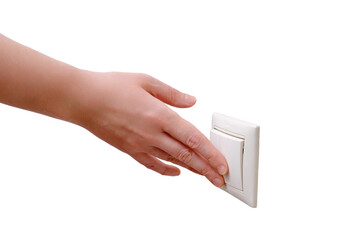 Woman reaches for the light switch, hand turns on the lamp close-up, isolated on a white...