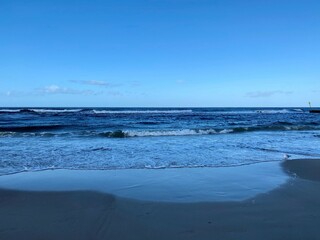 waves piling up over the baltic sea on a sunny day