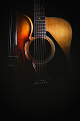 Obraz na płótnie Canvas A violin and acoustic guitar