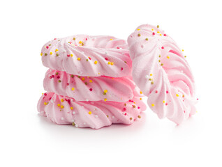 Pink sweet meringues with sprinkles isolated on white background.