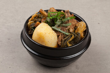 A stew boiled with spices such as potatoes, perilla seeds, green onions, and garlic in pork...