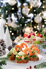 Delicious bruschetta with cream cheese, dill, salmon and shrimp .Festive Appetizer for christmas...