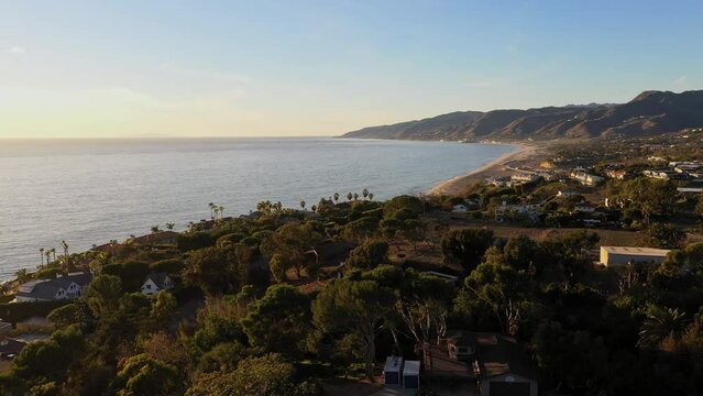 Aerial view of Zuma beach in Malibu, California from Point Dume. Crisp fall day with clear water near sunset.