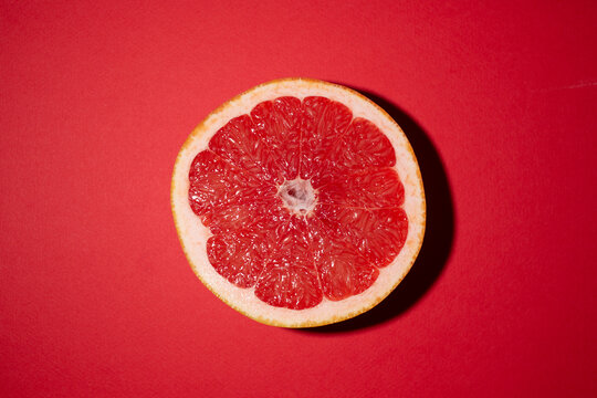 Studio shot of halved grapefruit